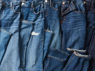 A line of jeans in various washes